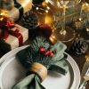 BLOG THUMBNAI_Anjali a festive table with a napkin holder decorated with a Christmas theme
