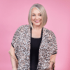 Leigh Ann Allaire Perrault Headshot on Baby Pink Background