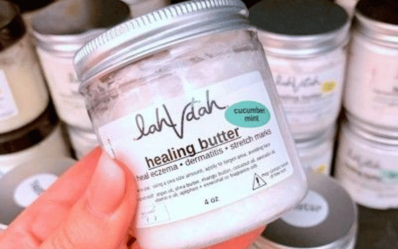 a small jar of lotion with a printed stocker logo on the front