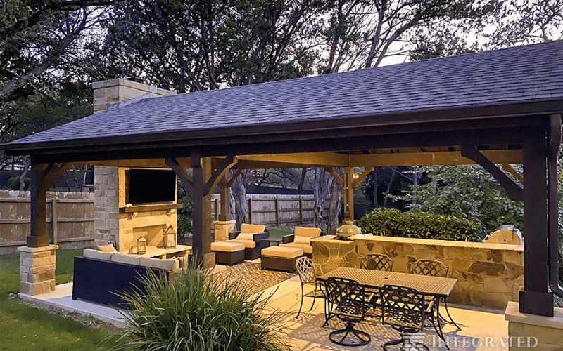 large patio with outdoor furniture and an outdoor kitchen 