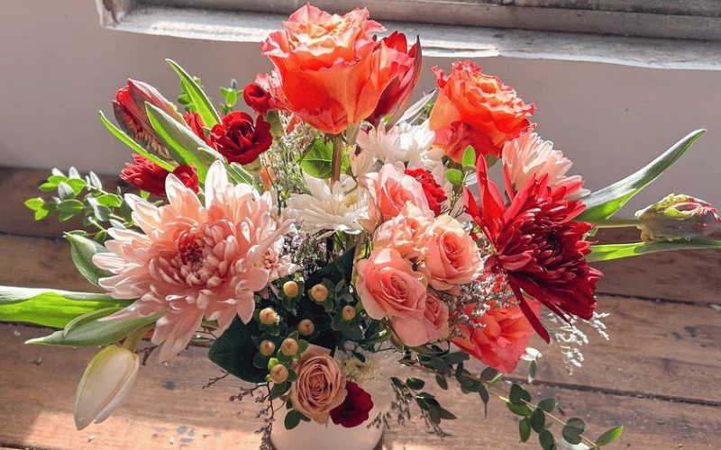 Orange, pink, red and white flower bouquet